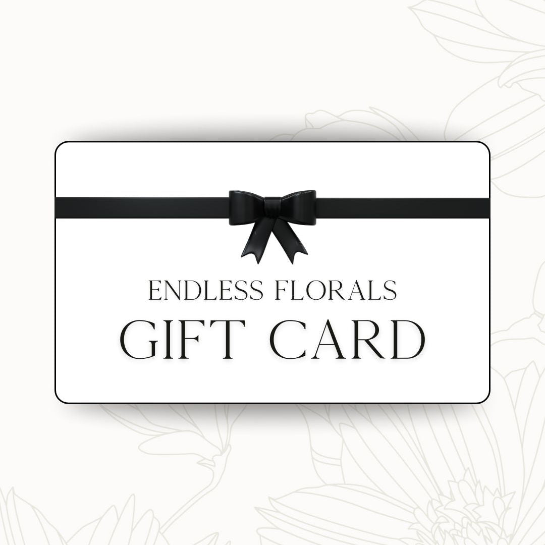 Gift card with a black bow and 'Endless Florals' text on a white background